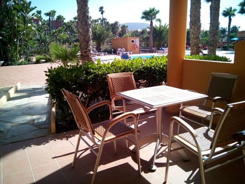 Large terrace overlooking the pool