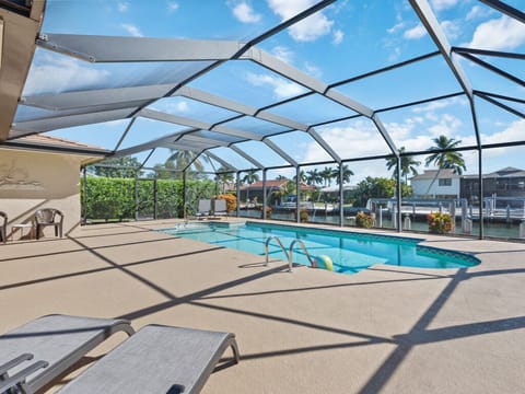 Large Screened pool and patio with full southern sun exposure