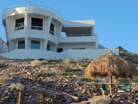 View of the house and the palapa from the beach