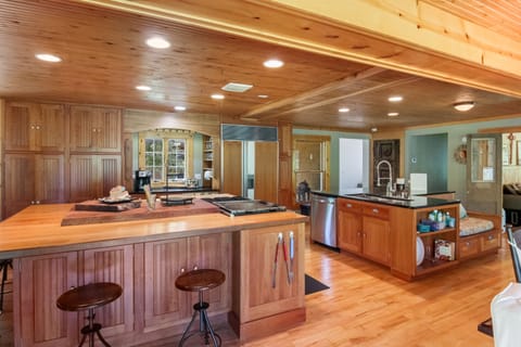 The kitchen has two large islands