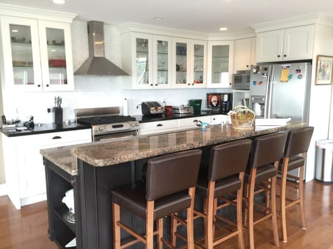 Kitchen with view over ocean.