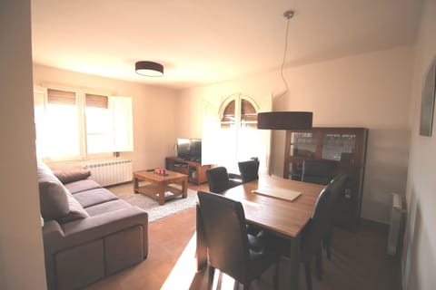 Living room with view on market square and mountains