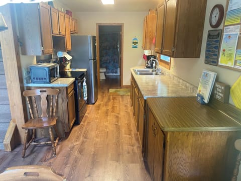Nice wood floor on the first floor & kitchen