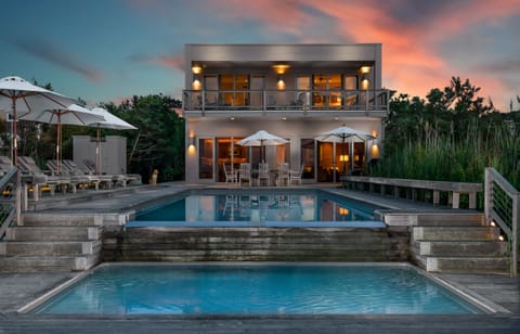 Perfect Bayfront Home with Heated Pool, Expansive Decks and Sunset Views