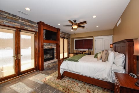 STUDIO lower bedroom King Bed, fireplace fold out couch leading to deck area