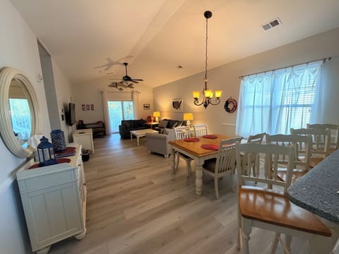Cathedral ceiling makes the entire living room/dining area feel even bigger.