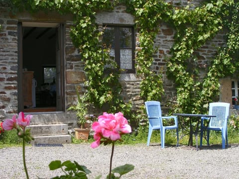 French windows open onto a south facing patio and
 garden area