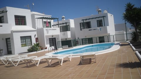 pool area, apartment at end, directly overlooking pool.