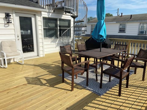 2nd floor 20' deck with grill and access to the roof deck. 