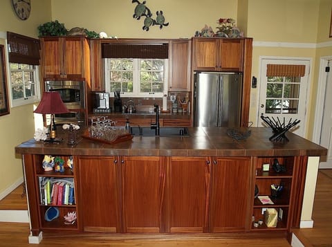 Chef's kitchen with mahogany cabinetry
