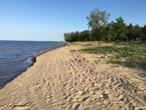 Over 200 feet of private, sandy beach 