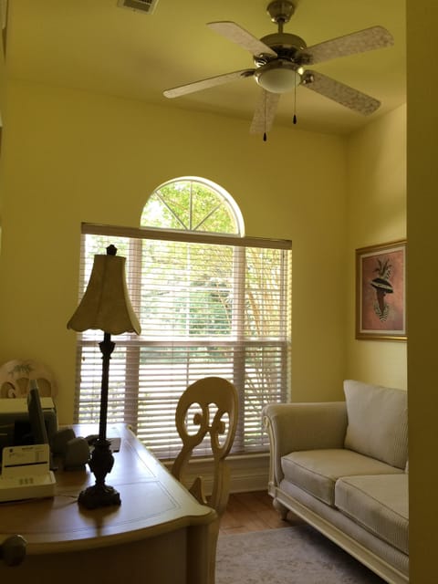 The office includes a third couch