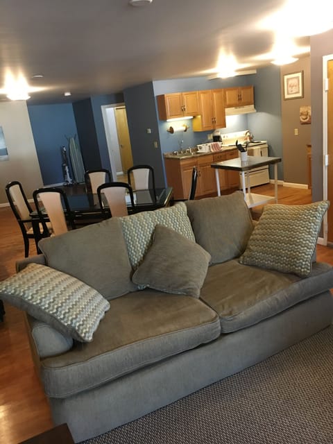 Large comfortable couch can double as another bed for one.