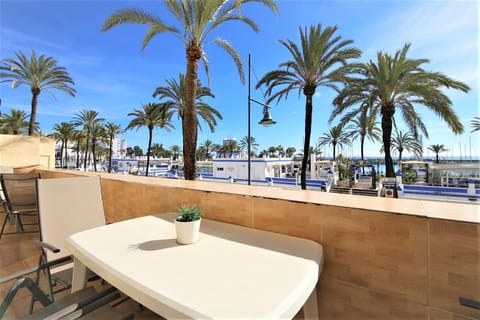 Beautiful views to the marina of Estepona from the balcony with comfortable seating