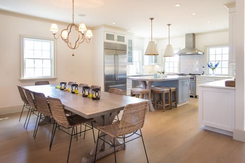Dining area and kitchen. Table seats 12 people. 