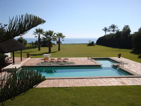 pool with view of beach