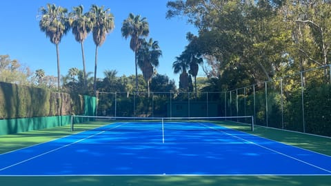 Newly resurfaced tennis court Plexipave surface