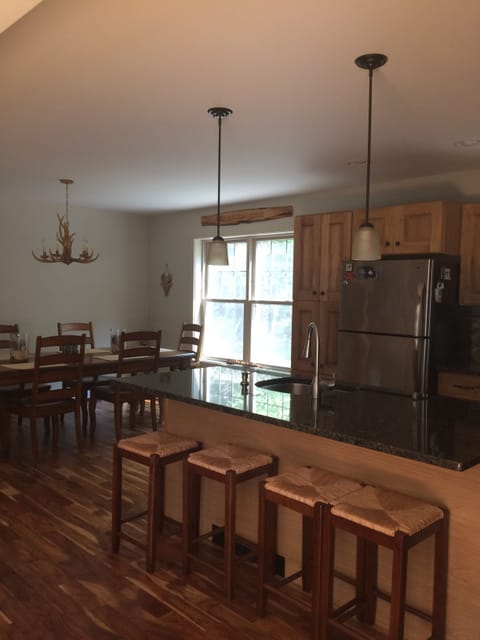 Spacious open kitchen . island seats 4 & dining table seats 6