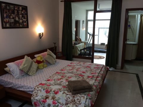 A king size bed in a decent size room
