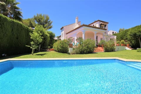Stunning villa with private gardens and swimming pool