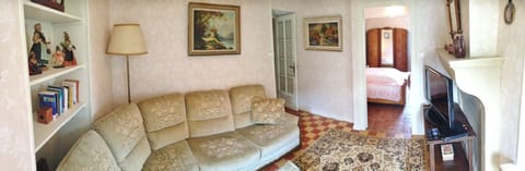 Sitting room with door to bedroom 2 visible on right