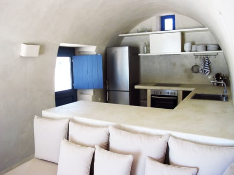 The kitchen / lounge area and the door to the pergola area