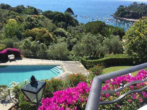 View from the property showing the garden and private swimming pool.