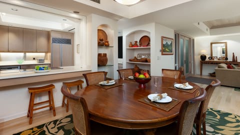 Easy access to the dining area from the kitchen with additional bar seating