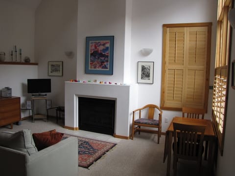 Living room with gas fireplace.
