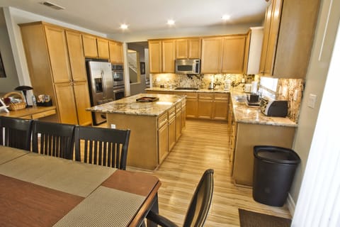 Kitchen- fully stocked with all necessary pots, pans, plates, glasses, cutlery, 