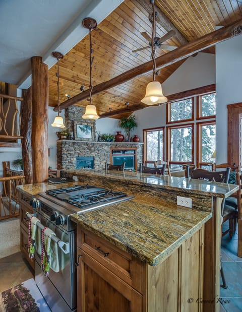 Kitchen and view of dining and living area