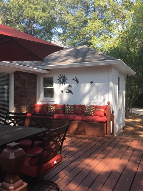 Large back deck with table for 6 and lots of seating.