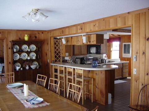 Dining room, kitchen - Wisconsin Lake Home Rental - Tennis Court, Hot tub