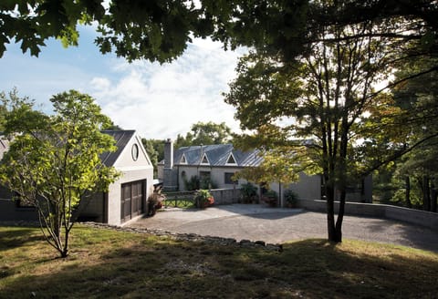 The house sits on 20 acres, down a long private drive.