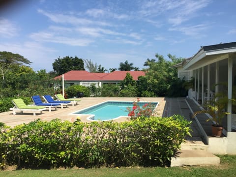 Relax by the pool with a cold beer, cocktail or a refreshing  fruit punch 