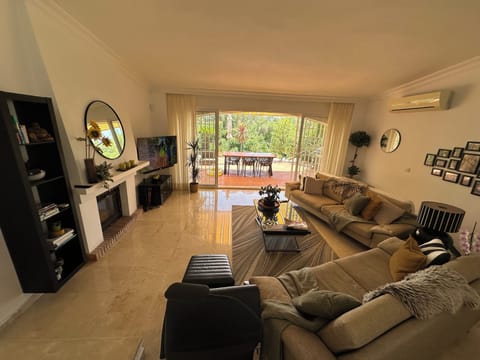 View from the dining area through the lounge on to the south facing terrace