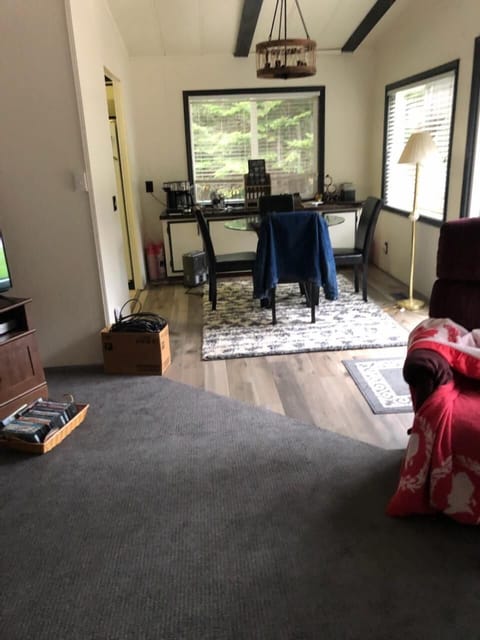 Showing the new floor and paint in the dining room and part of the living area.