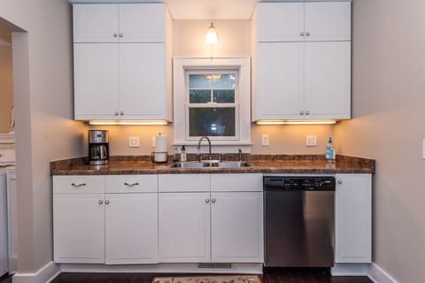 All the necessities: Coffee maker, dishwasher, stove, refrigerator, oven & micro