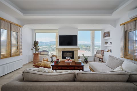 western view living room with smart TV & fire place