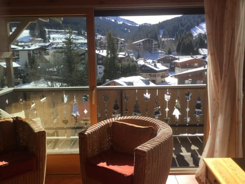 view of the balcony and village from the lounge