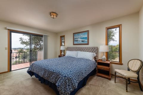 Master bedroom #1with private balcony and water view 