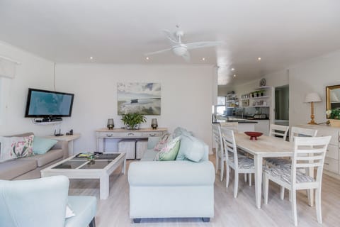 Lounge showing dining area and kitchen