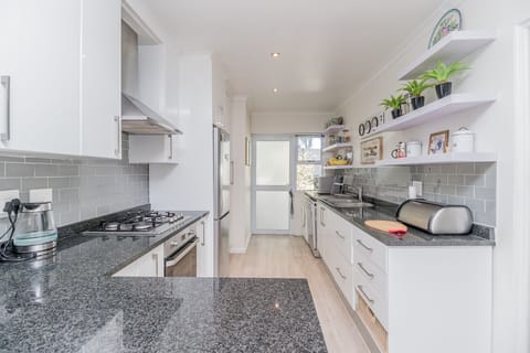 View of kitchen from dining area
