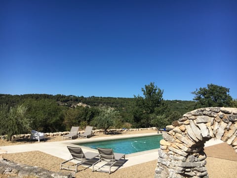 Swimming pool with view over Abbaye de Saint Hilaire