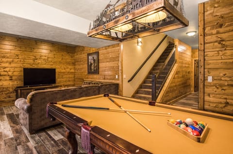 Play some pool in the lower level of your lodge