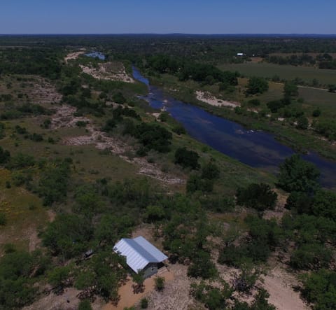 Cabin overlooks the Llano River.