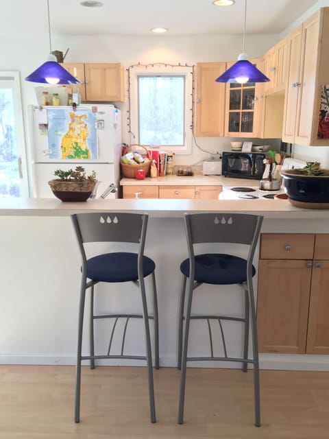 Bar seating at the kitchen counter