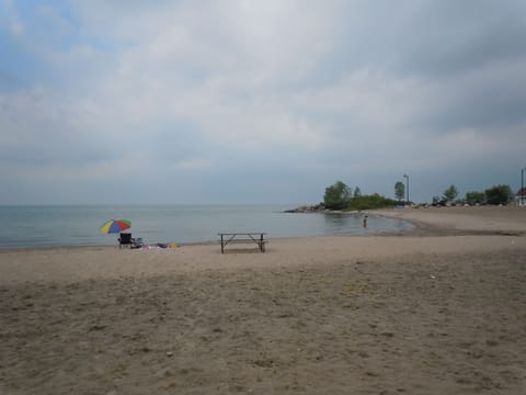sandy shallow beach just steps from the cottage