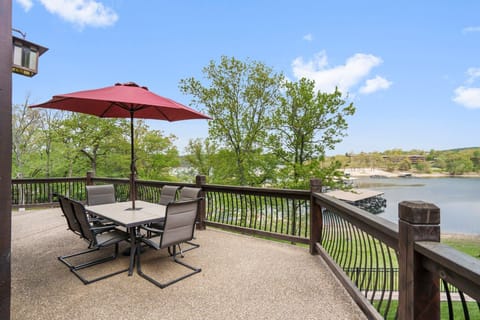 Two outdoor tables that seat 8 outside on the main level deck