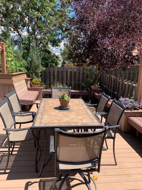 Seating for 6 with plenty of benches for additional seating. 